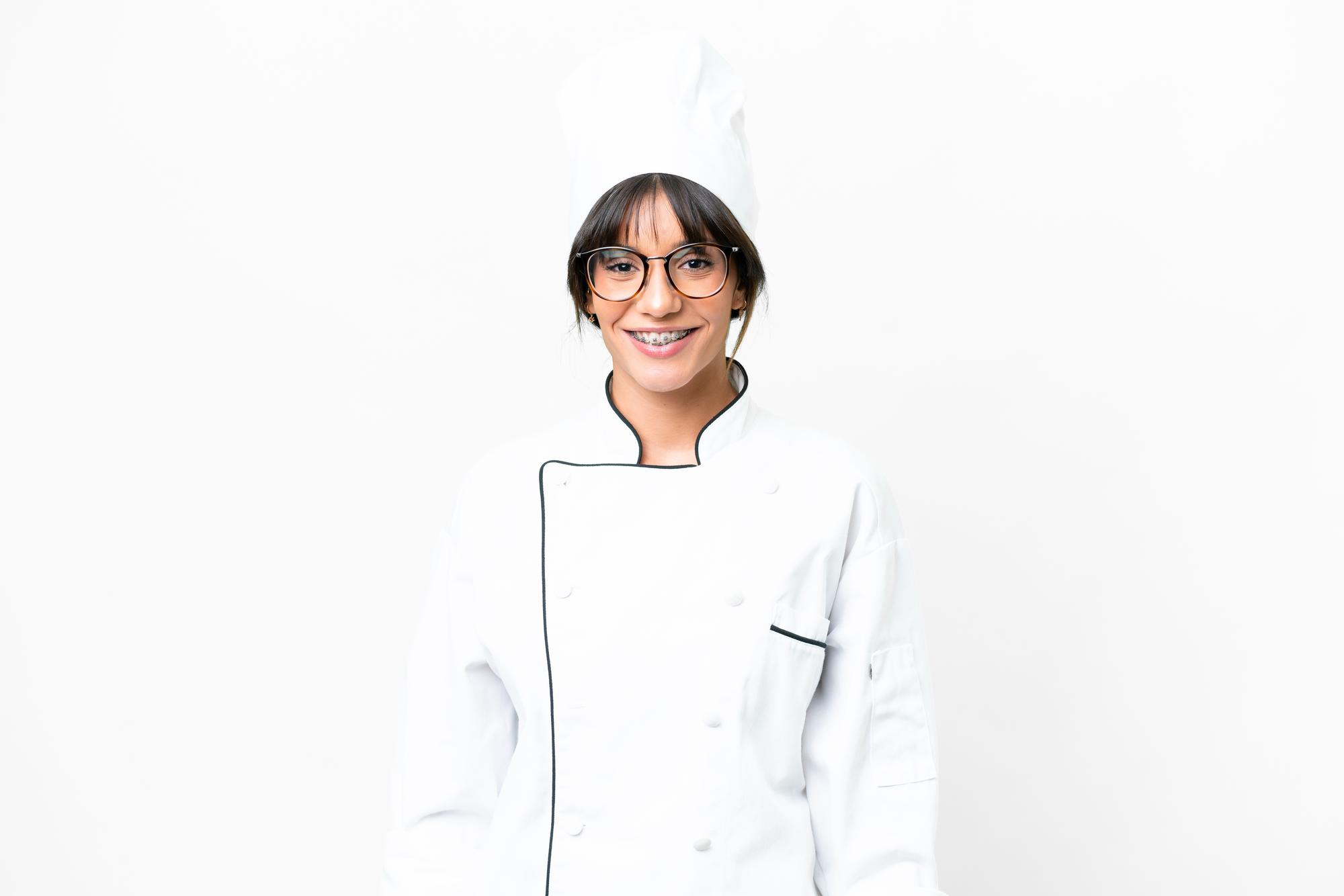 Instructor smiling in kitchen workspace